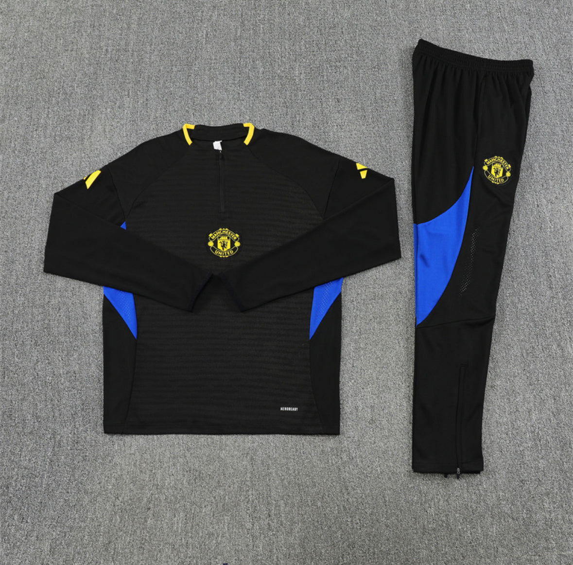 Man Utd 25/26 1/4 Zip Tracksuit